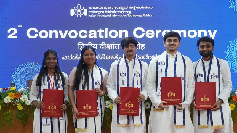 Graduates holding their degree certificates at IIIT Raichur's 2nd Convocation Ceremony